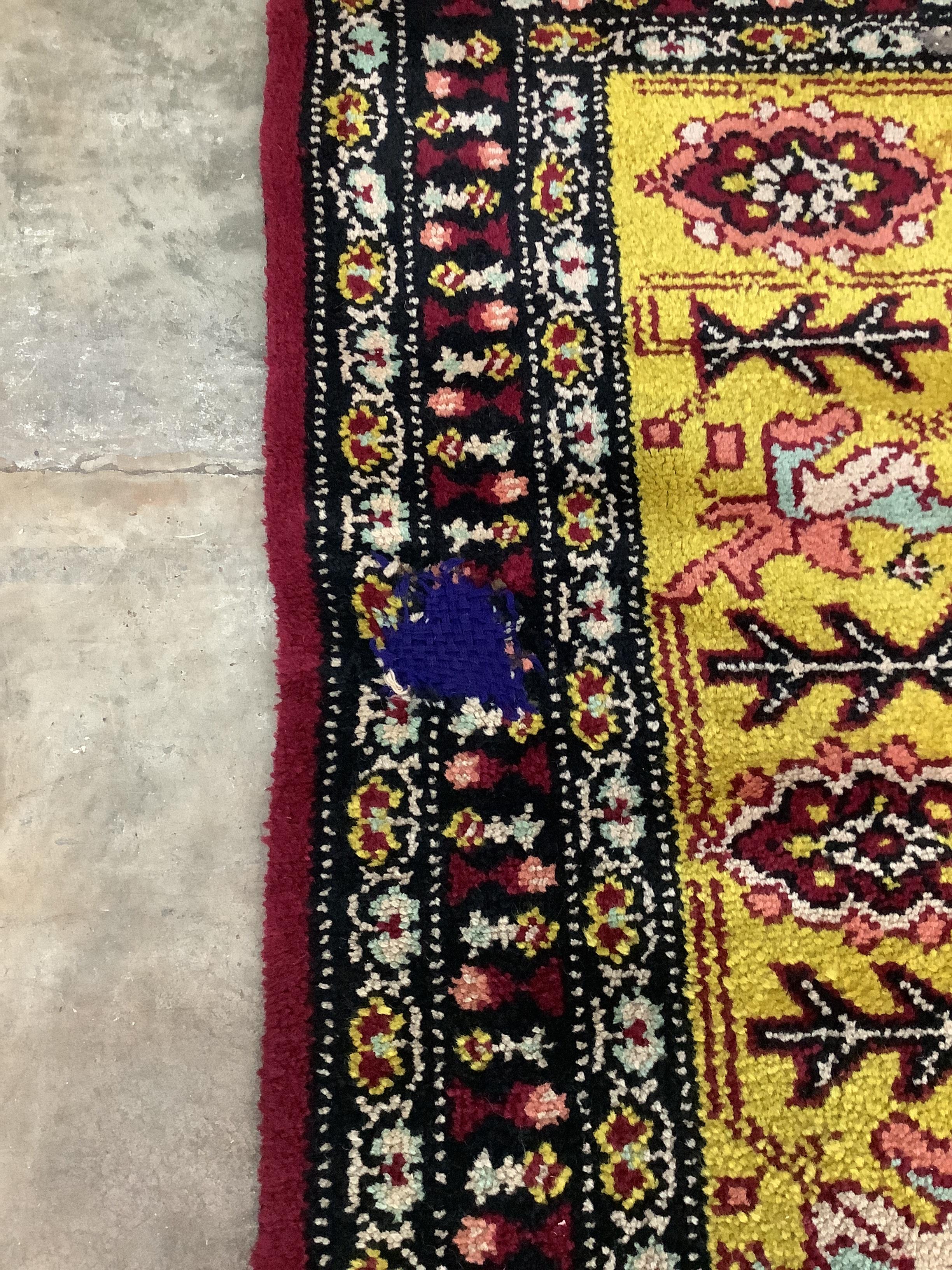 A Turkish carpet, approx. 380 x 350cm